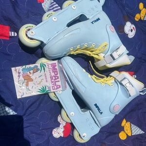 Impala Light Blue Roller Skates with Yellow Laces